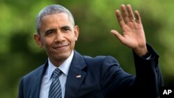 FILE - President Barack Obama walks across the South Lawn of the White House, in Washington, July 5, 2016.