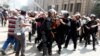 Morsi Supporters, Military Backers Scuffle in Cairo