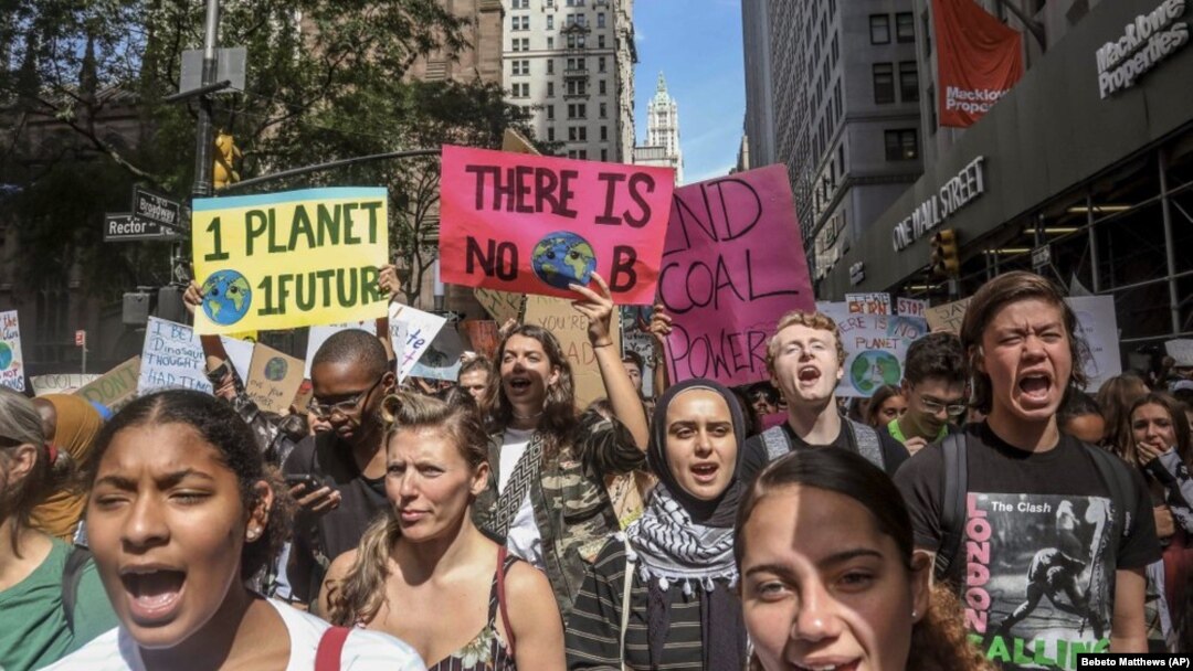 FILE - In this Friday Sept. 20, 2019 file photo, climate change activists participate in an environmental demonstration as part of a global youth-led day of action in New York, as a wave of climate change protests swept across the globe.