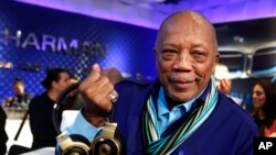 FILE - Quincy Jones unveils his new N90Q headphones from AKG, the world's first headphones with personalized sound, at the HARMAN flagship store in New York.