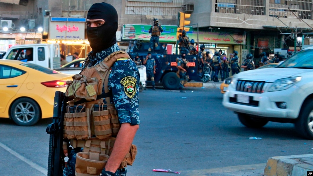 Iraqi Federal police are deployed in Sadr City, Baghdad, Iraq, Oct. 7, 2019. 