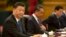 FILE - In this July 2, 2019, file photo, Chinese President Xi Jinping sits during a meeting at the Great Hall of the People in Beijing. Chinese authorities have declined to renew the press credentials of a Beijing-based Wall Street Journal reporter…