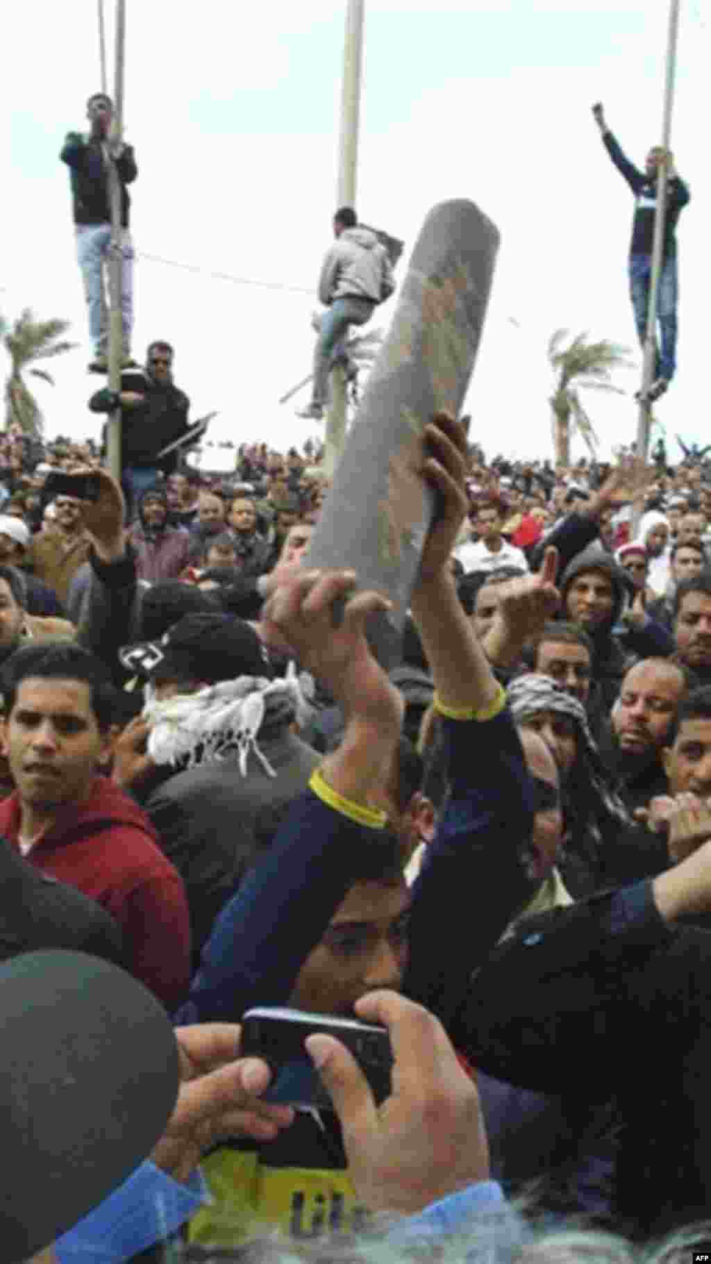 This photograph, obtained by The Associated Press outside Libya and taken by an individual not employed by AP, shows a large gathering during recent days' unrest in Benghazi, Libya. (AP Photo) EDITOR'S NOTE: THE AP HAS NO WAY OF INDEPENDENTLY VERIFYING TH