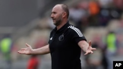 FILE — Algeria's coach, Djamel Belmadi reacts, on the touchline, during the African Cup of Nations 2022 group E soccer match against Sierra Leone at the Japoma Stadium in Doula, Cameroon, Tuesday Jan. 11, 2022.