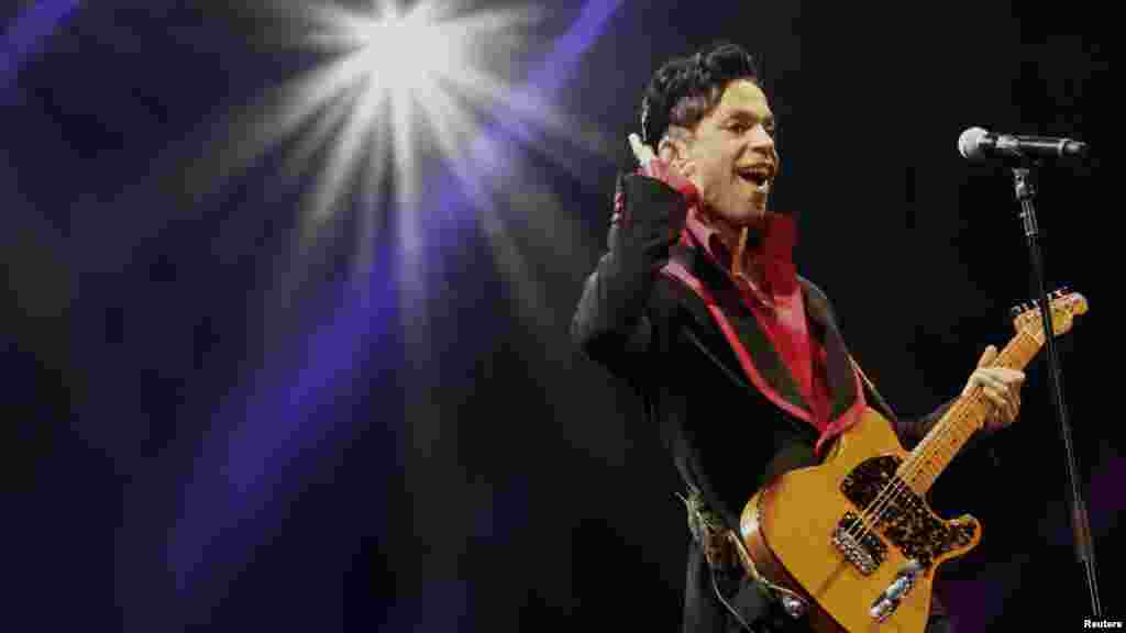 U.S. musician Prince performs on stage at Yas Arena in Yas Island, Abu Dhabi, UAE, Nov. 14, 2010.