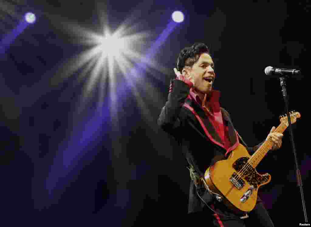 U.S. musician Prince performs on stage at Yas Arena in Yas Island, Abu Dhabi, UAE, Nov. 14, 2010. 