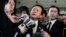 Tokyo Governor Naoki Inose (C) is surrounded by media as he speaks to reporters at Tokyo Metropolitan Government headquarters in Tokyo, Apr. 30, 2013.