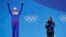 Women's cross-country 7.5/7.5km skiathlon gold medalist Charlotte Kalla, of Sweden, right, applauds as silver medalist Marit Bjoergen, of Norway, reacts during their medals ceremony at the 2018 Winter Olympics in Pyeongchang, South Korea, Feb. 10, 2018.