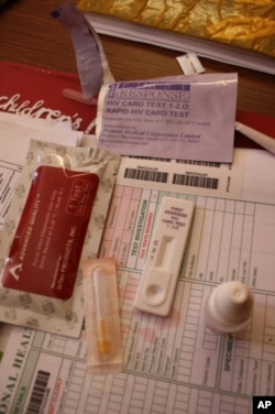 The contents of a 'First Response HIV Card Test' await use at a government clinic in Johannesburg