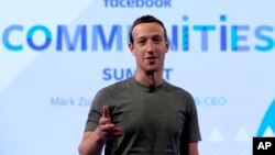 FILE - Facebook CEO Mark Zuckerberg speaks in preparation for the Facebook Communities Summit, in Chicago, Illinois, June 21, 2017. 