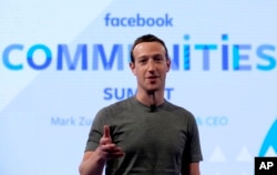 FILE - Facebook CEO Mark Zuckerberg speaks in preparation for the Facebook Communities Summit, in Chicago, Illinois, June 21, 2017.