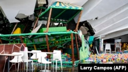 This handout picture released by Regional Government of La Libertad shows damages after the roof of a shopping mall collapsed in Trujillo, Peru, Feb. 22, 2025. (Photo by Larry Campos/Peru's Regional Government of La Libertad/AFP) 