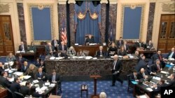 In this image from video, Kenneth Starr, an attorney for President Donald Trump, walks up to the podium during Trump's impeachment trial in the Senate at the Capitol in Washington, Jan. 27, 2020.