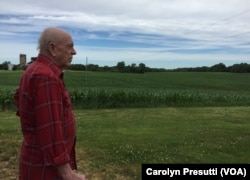 Jim Guetterman owns about 200 hectares of corn and soybeans behind Hodgkinson’s house. He says everybody's got a gun these days.