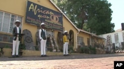 Reine Osso runs the "African Queen" Arts and Crafts store in Johannesburg, South Africa