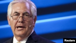 FILE - ExxonMobil Chairman and CEO Rex Tillerson speaks at an energy conference in Houston, Texas April 21, 2015. 
