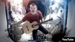 Canadian astronaut Chris Hadfield sings aboard the International Space Station, May 12, 2013.