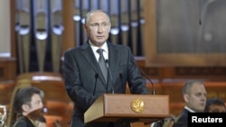 Russian President Vladimir Putin delivers a speech at the gala concert of the 15th International Tchaikovsky Competition at the Moscow Conservatory, Russia, July 2, 2015.