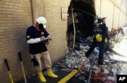 This undated photo provided by the FBI shows damage to the Pentagon caused during the 9/11 attacks. This was one of 27 photos that were posted to the FBI website in 2011 but disappeared recently because of a technical glitch.