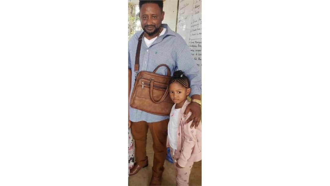 Kadijah Saccoh, who was raped and killed in June, allegedly by a family member in Sierra Leone, is seen with her father, Abubakarr Saccoh, in this photo taken from his Facebook account.