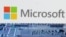 FILE - Microsoft logo is seen near computer motherboard in this illustration taken January 8, 2024. 
