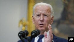 President Joe Biden speaks about Hurricane Henri and Afghanistan evacuations in the Roosevelt Room of the White House, Sunday, Aug. 22, 2021, in Washington. (AP Photo/Manuel Balce Ceneta)