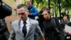 FILE - Singer Tulisa Contostavlos leaves Southwark Crown Court, central London, April 22, 2014.