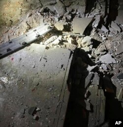 This photo released by the Iraqi Prime Minister Media Office shows the damage of the drone attack at the home of Iraq's Prime Minister Mustafa al-Kadhimi in Baghdad, Nov. 7, 2021. (Iraqi Prime Minister Media Office via AP)