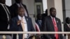 FILE - South Sudanese President Salva Kiir, right, and Vice President Riek Machar, left, attend an event at the John Garang Mausoleum in Juba, South Sudan, on Feb. 5, 2023. Kiir and Machar agreed in June 2024 to postpone general elections until December 2026.