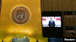 Indonesia’s President Joko Widodo remotely addresses the 76th Session of the U.N. General Assembly by pre-recorded video in New York City, U.S., September 22, 2021. REUTERS/Eduardo Munoz/Pool