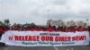 In this Monday, May 26, 2014, photo, the Nigerians United Against Terrorism group attends a demonstration calling on the government to rescue the kidnapped girls of the government secondary school in Chibok, in Abuja, Nigeria. Nigeria's defense chief sai