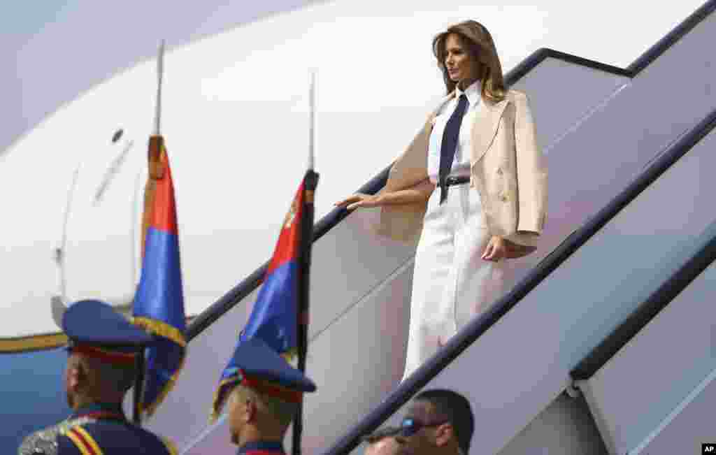 First lady Melania Trump is greeted by Egyptian first lady Entissar Amer as she arrives at Cairo international airport, Egypt, Oct. 6, 2018. 
