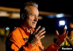 FILE - Swiss aviator of the solar-powered plane Solar Impulse 2 Andre Borschberg speaks with journalists before taking off at San Pablo airport in Seville, southern Spain, July 11, 2016.