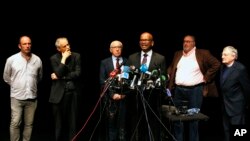 Ram Manikkalingam, third right, president of the Verification Commission for disarmament of ETA, the Basque armed separatist group, announces delivery of ETA weapons to French authorities, surrounded by others, from left, peace activist Jean-Noel Etcheverry, Bishop Matteo Zuppi, Bayonne Mayor Jean-Rene Etchegaray, French human right lawyer Michel Tubiana and Rev. Harold Good, during a press conference in Bayonne, southwestern France, Saturday, April 8, 2017.