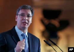 FILE - Serbian Prime Minister Aleksandar Vucic speaks during the Business Forum Serbia-Albania, in the town of Nis, Serbia, Oct. 14, 2016.