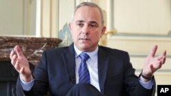 FILE - Israeli Strategic Affairs Minister Yuval Steinitz, shown in an interview in March 2015, says Iran continues to be a threat to his country and to all other nations in the Middle East. 