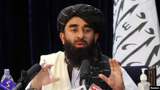 Phát ngôn viên Taliban, Zabihullah Mujahid tại cuộc họp báo ở Kabul, Afghanistan, ngày 17/8/2021.