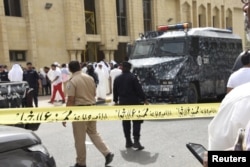 Police cordon off the Imam Sadiq Mosque after a bomb explosion following Friday prayers, in the Al Sawaber area of Kuwait City June 26, 2015.