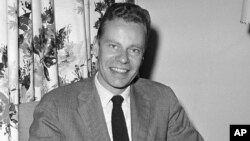 FILE - Charles Van Doren, who won thousands of dollars on the television quiz show "Twenty-One," is shown, Oct. 14, 1959, in New York's Hotel Roosevelt.