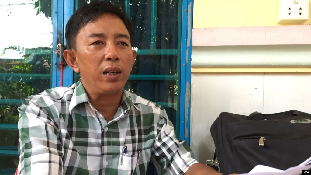 Sar Neang, 47, Deputy commune chief of Khmuonh, CNRP's first candidate talks to VOA about the coming commune elections at his home in Sen Sok's Khmuonh on May 10. (Phorn Bopha/VOA Khmer) 