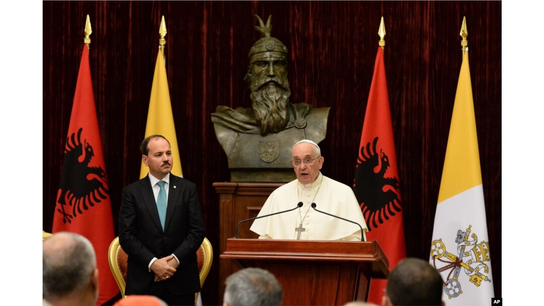 Albania PopePope Francis delivers his speech as Albania's President Bujar Nishani, left, watches in Tirana, Sept. 21, 2014.