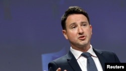 FILE - French economist Gabriel Zucman speaks during a news conference on the launch of the European Tax Observatory, in Brussels, Belgium June 1, 2021. Zucman authored a report proposing a 2% global tax on the super-rich. 