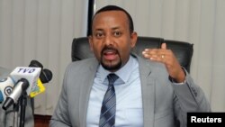 FILE - Abiy Ahmed addresses a news conference in Addis Ababa, Ethiopia, Dec. 4, 2015. 