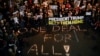 Supporters and family members of hostages protest ahead of a ceasefire between Israel and Hamas, in Tel Aviv