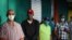 People wearing protective masks stand in line to cast their votes in the general election during the outbreak of the coronavirus disease (COVID-19), in Santiago, Dominican Republic, July 5, 2020. 
