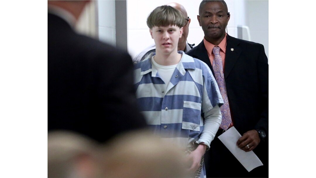 FILE - Dylann Roof enters the court room at the Charleston County Judicial Center to enter his guilty plea on murder charges in Charleston, S.C., April 10, 2017.