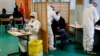 A student of the Emile Dubois high school takes part in a COVID-19 antigen test in Paris, France Nov. 23, 2020.