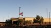 FILE - This June 20, 2019, file frame from video shows the entrance of a Border Patrol station in Clint, Texas. 