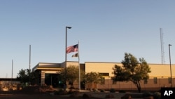 FILE - This June 20, 2019, file frame from video shows the entrance of a Border Patrol station in Clint, Texas. 