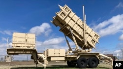 FILE - A Patriot missile mobile launcher sits outside the Fort Sill Army Post near Lawton, Oklahoma, March 21, 2023. The Pentagon says it has nearly $6 billion in funding for Ukraine left that could expire at month's end unless Congress or the State Department takes action.